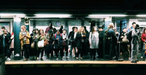 A crowded subway platform in New York City.