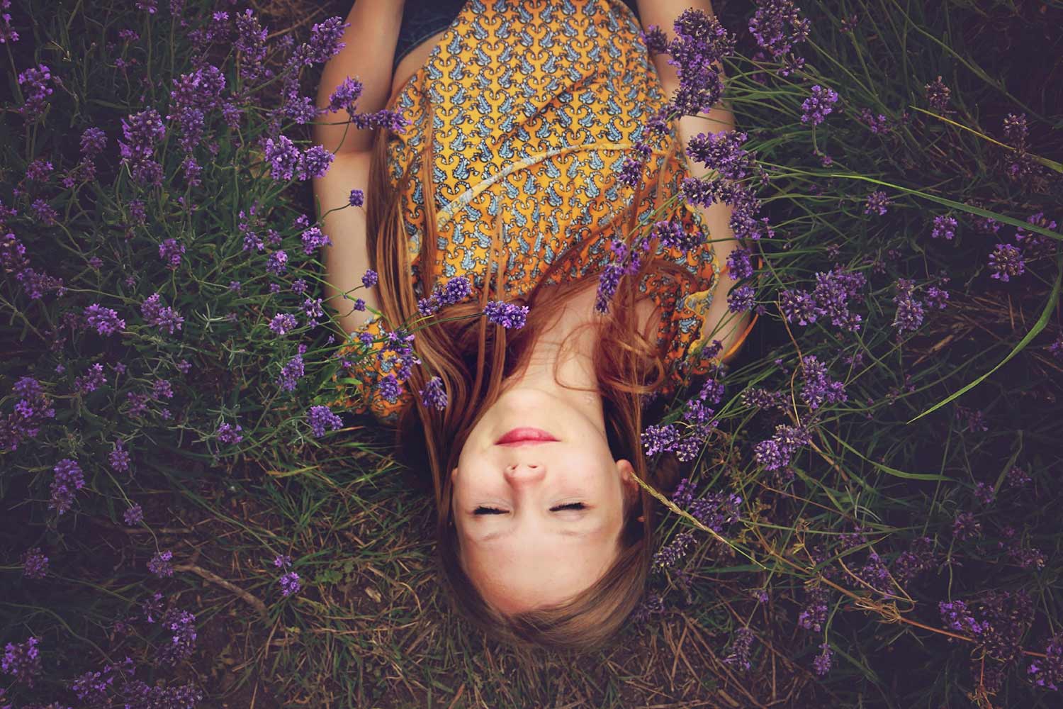 woman-laying-in-flowers