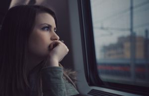 woman-looking-out-window