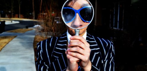man-with-magnifying-glass