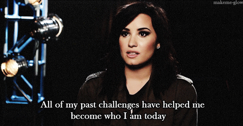 Gif of Demi Lovato with text "All of my past challenges have helped me become who I am today."