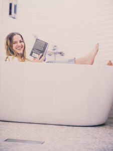 woman-reading-in-tub