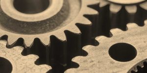 Gears turning together. employers-investing-employee-wellness
