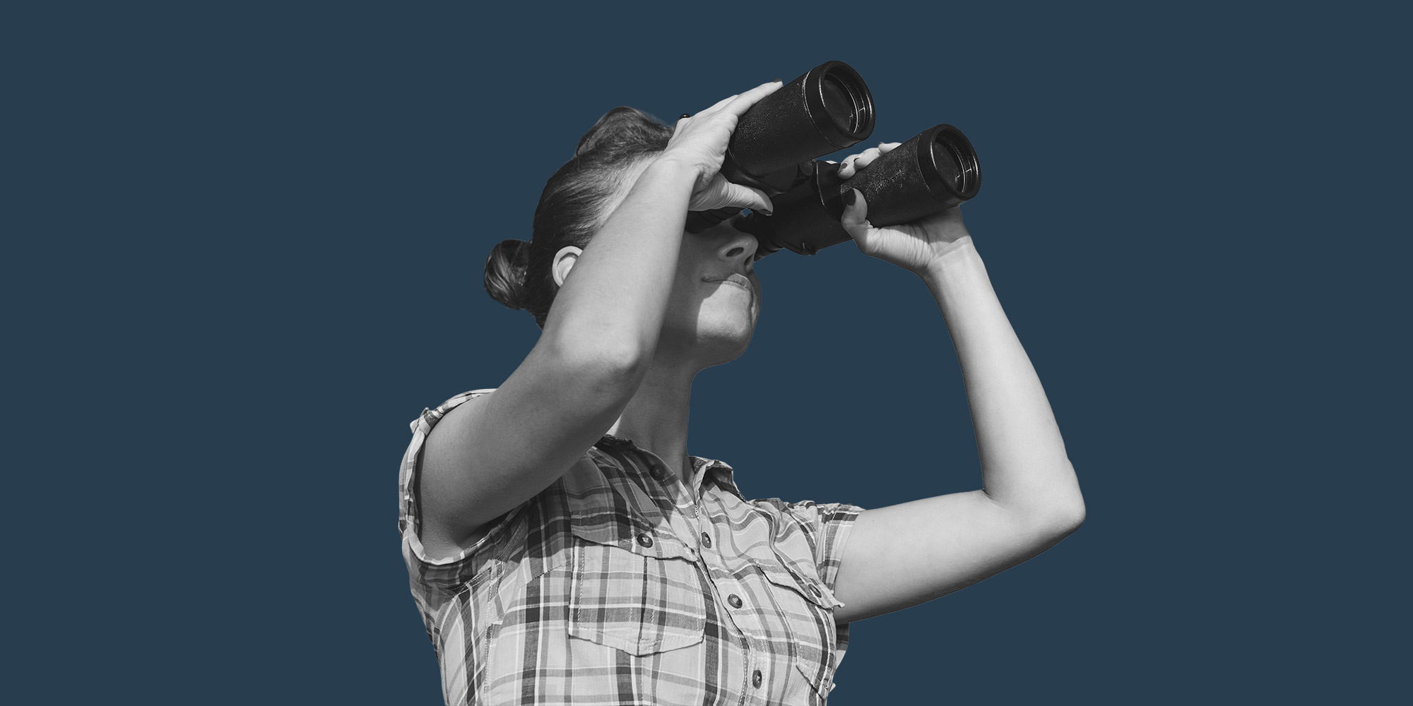 Woman with binoculars. looking for addiction treatment