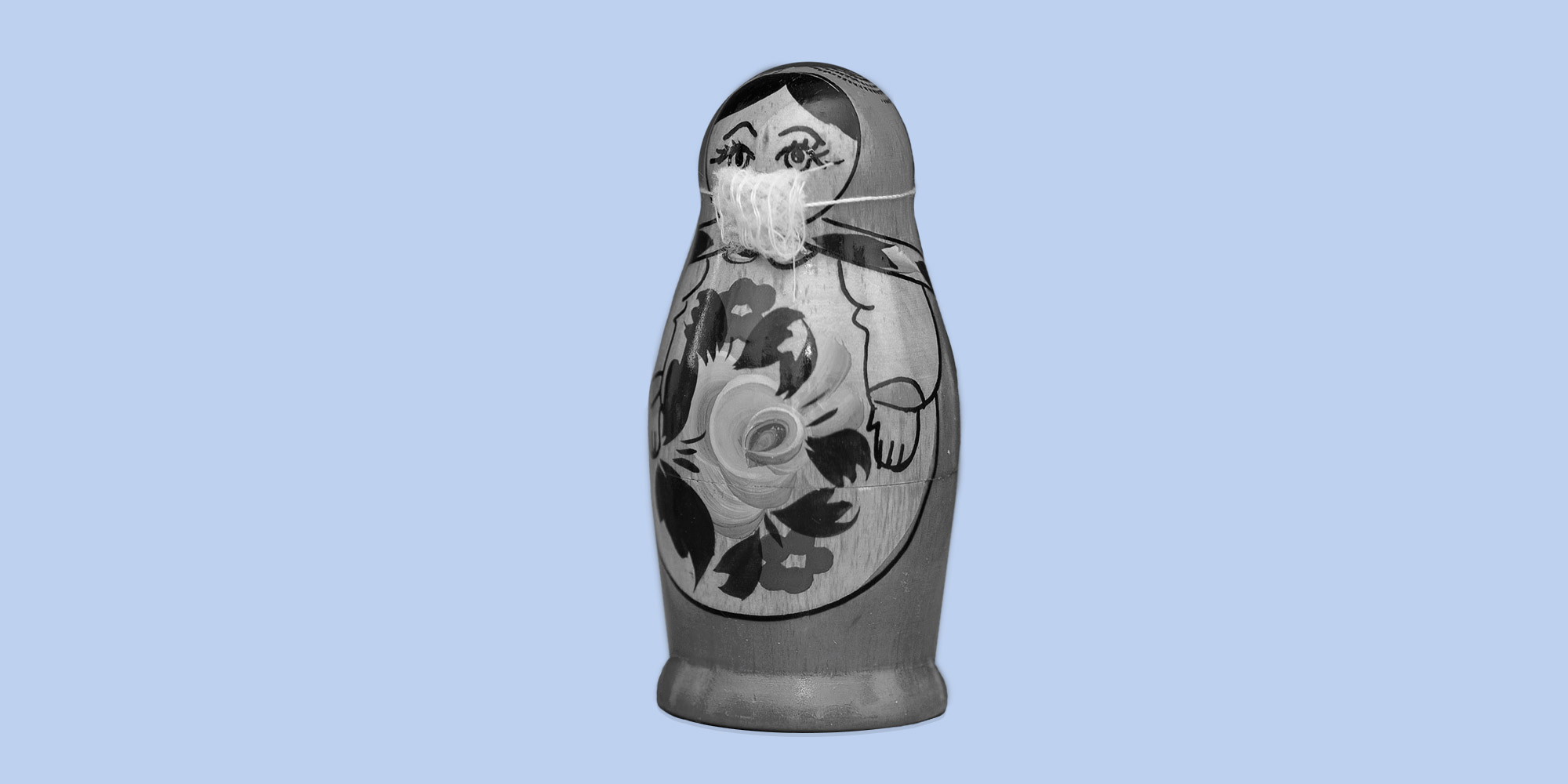 Russian nesting doll wearing a face mask; Corona Virus Stress