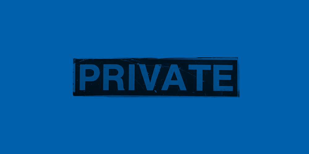 The word "Private" looking as though it were stenciled onto a a cobalt blue background