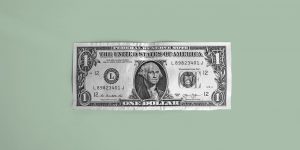 dollar bill on a green background