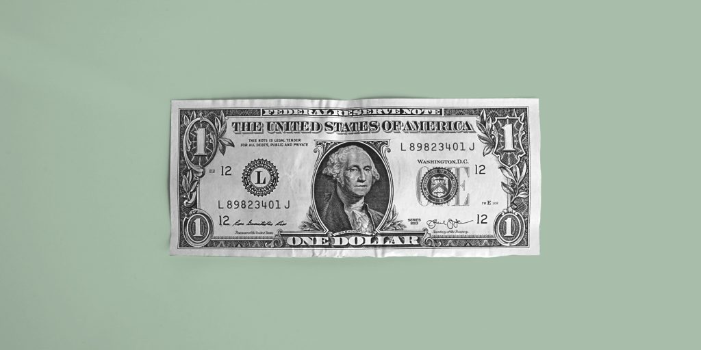 dollar bill on a green background