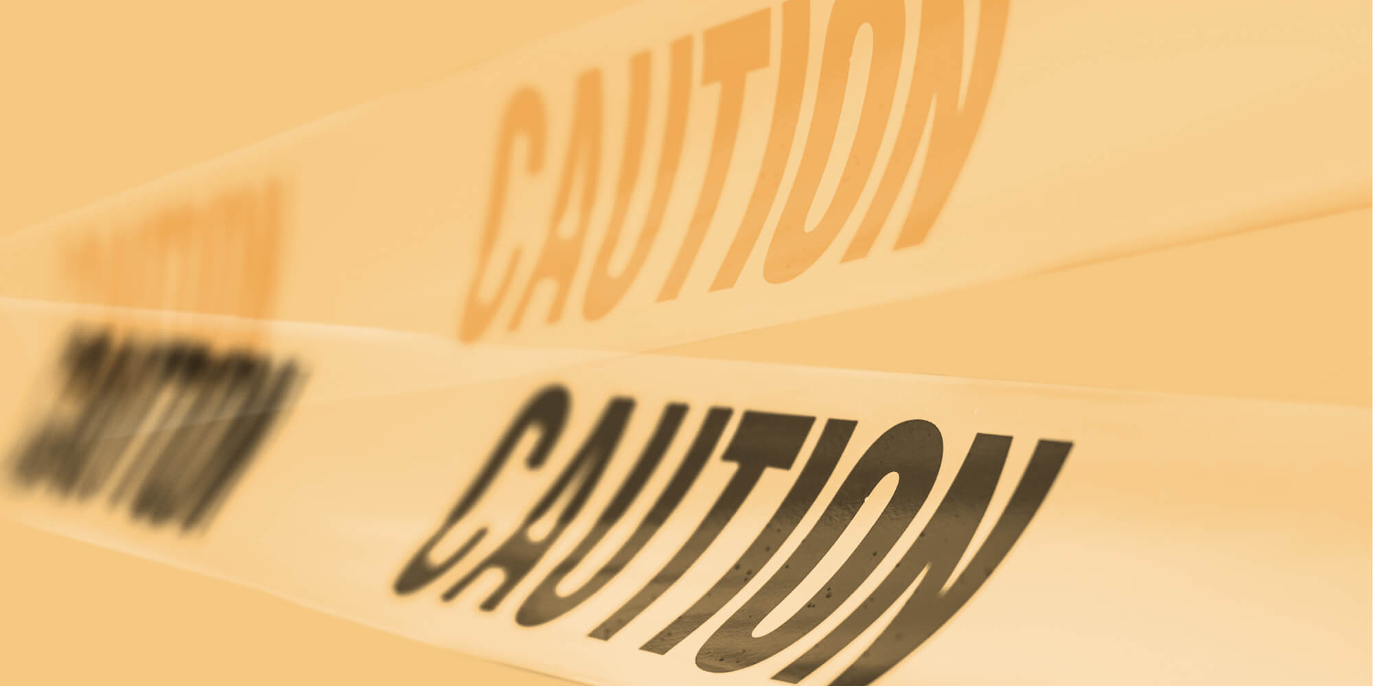 Caution tape on a yellow backdrop. The dangers of buying naltrexone without a prescription