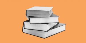 Stack of books on an orange background. Books on addiction