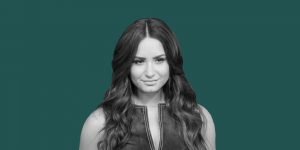 Demi Lovato on a green background. What is Cali Sober?