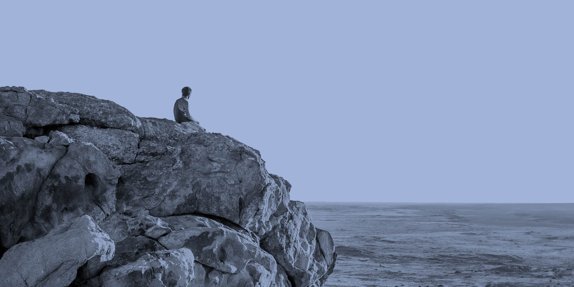 Sitting alone on a rock, looking at the ocean. Why do people drink alone?