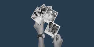 hands holding Polaroid photos of families. Family & recovery: A new beginning