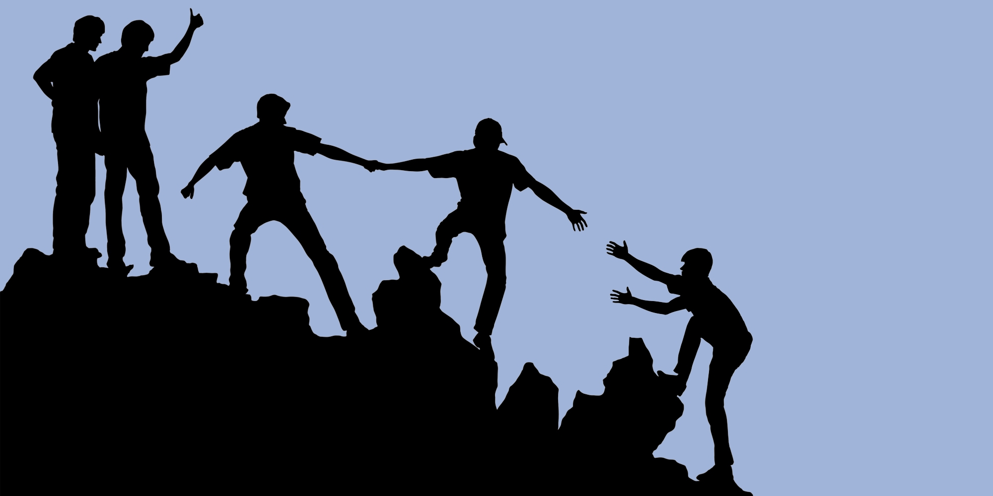 Silhouette of a group helping one another climb a rocky outcrop. Harm reduction