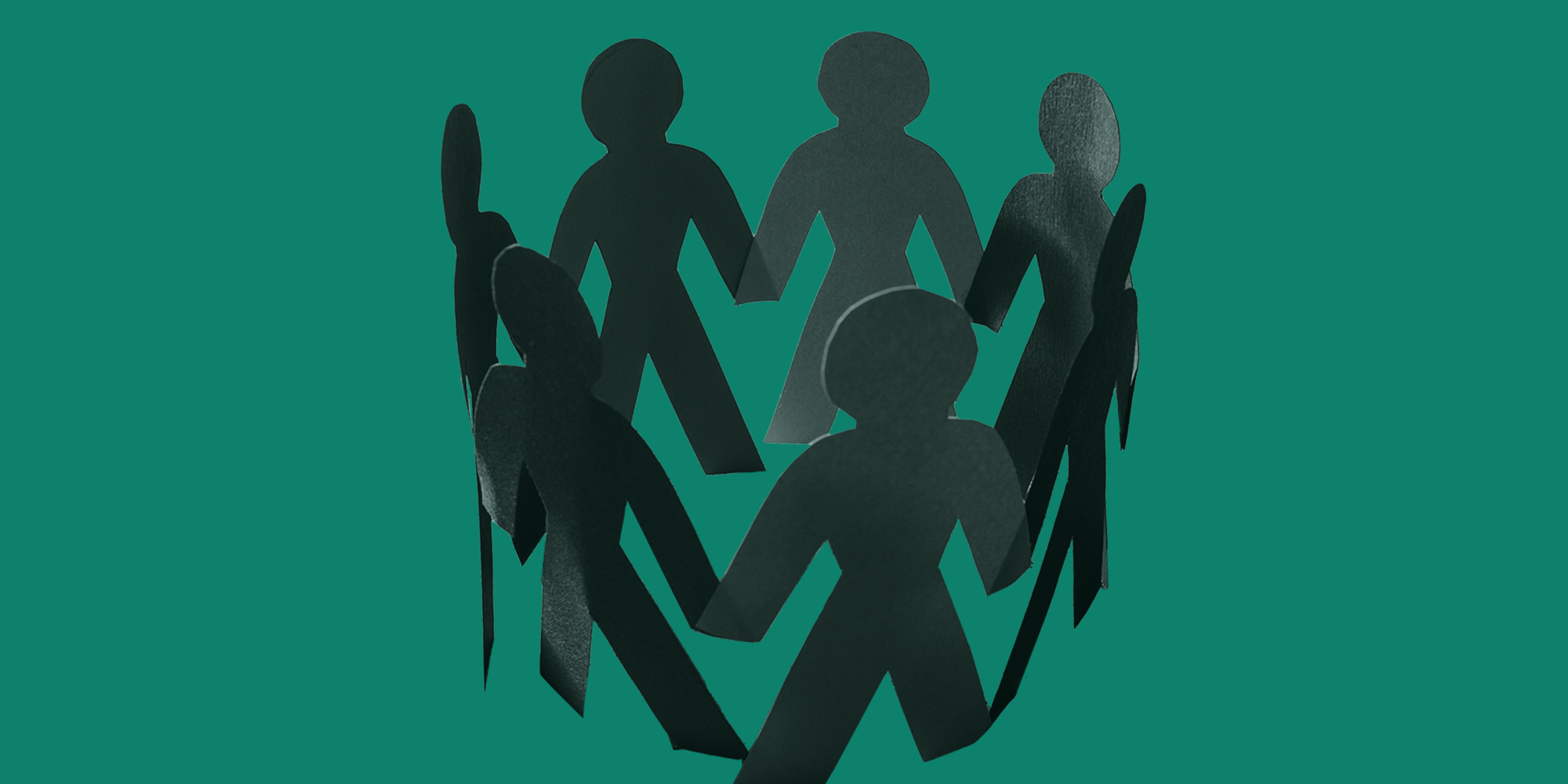 A circle of paper people holding hands. Substance use in the LGBTQIA community