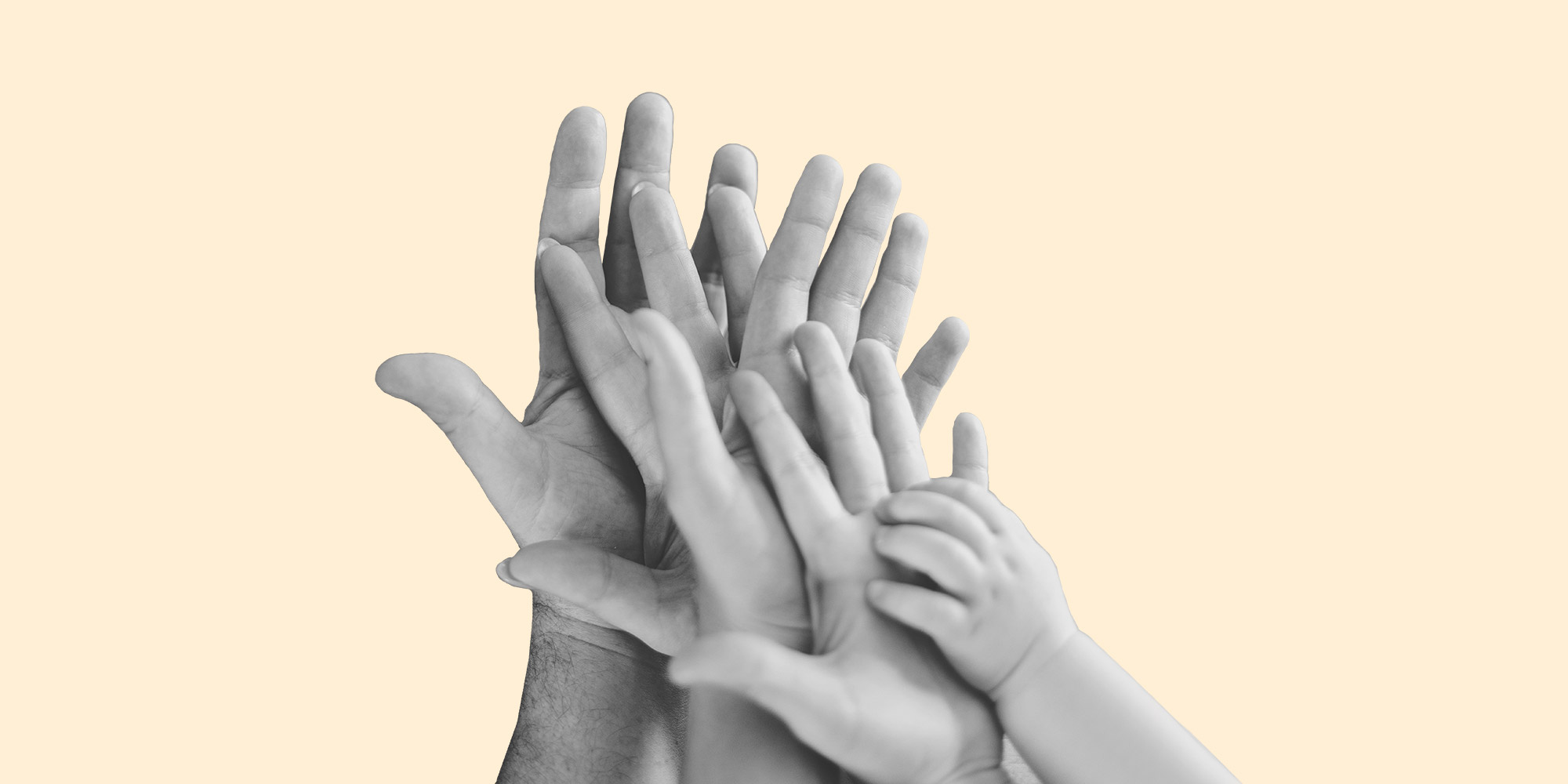 The hands of a man, woman, child, and baby, all pressed together. Parenting in recovery: Communication is key
