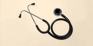 Stethoscope on yellow background. Is it safe to take Suboxone if I have hepatitis C?