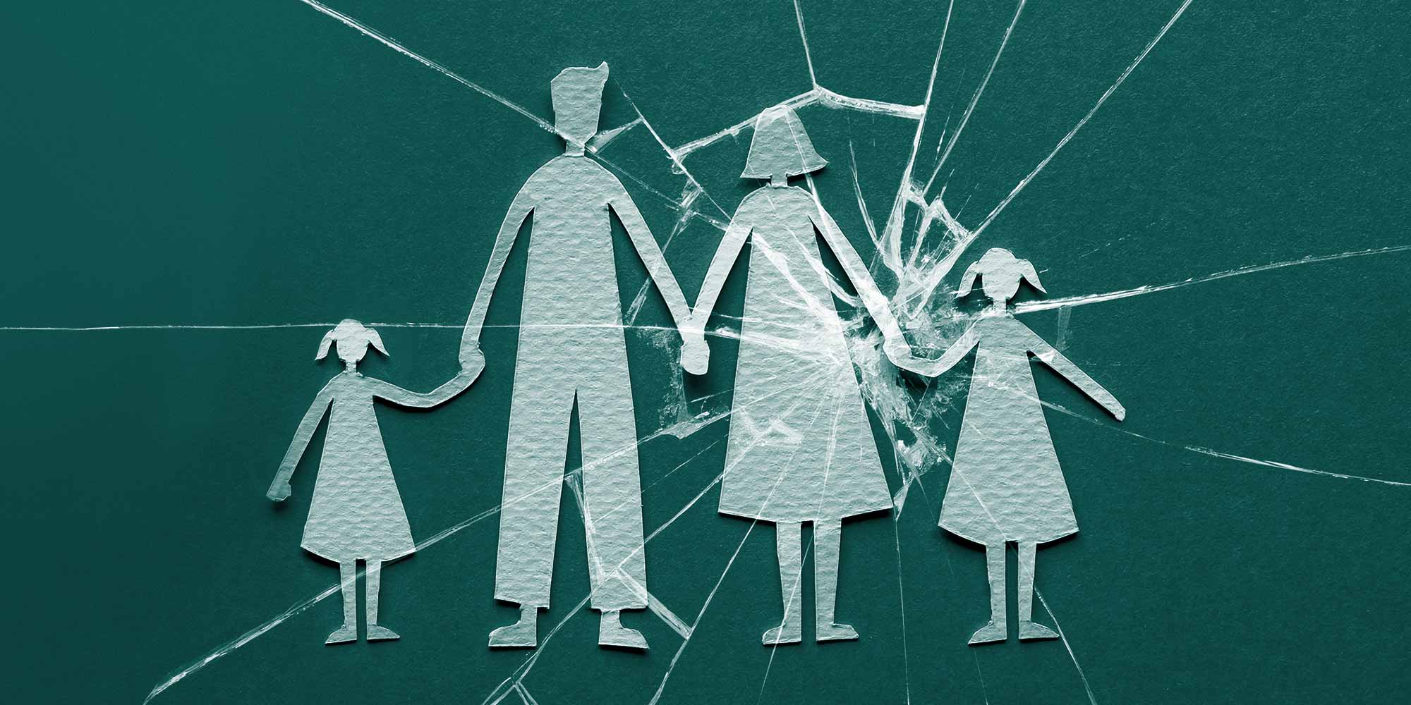 Paper cutouts of a family holding hands, with cracked glass centered over mother and daughter. Adult child of an alcoholic