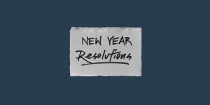 Handwritten note that says "New Year Resolutions". New Year's resolutions fail often.