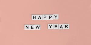 Letter tiles spelling out Happy New Year. Celebrate New Year's Eve without drugs.