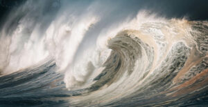 Image of a large wave of water curling and craching into itself. Getting Sober and Anxiety