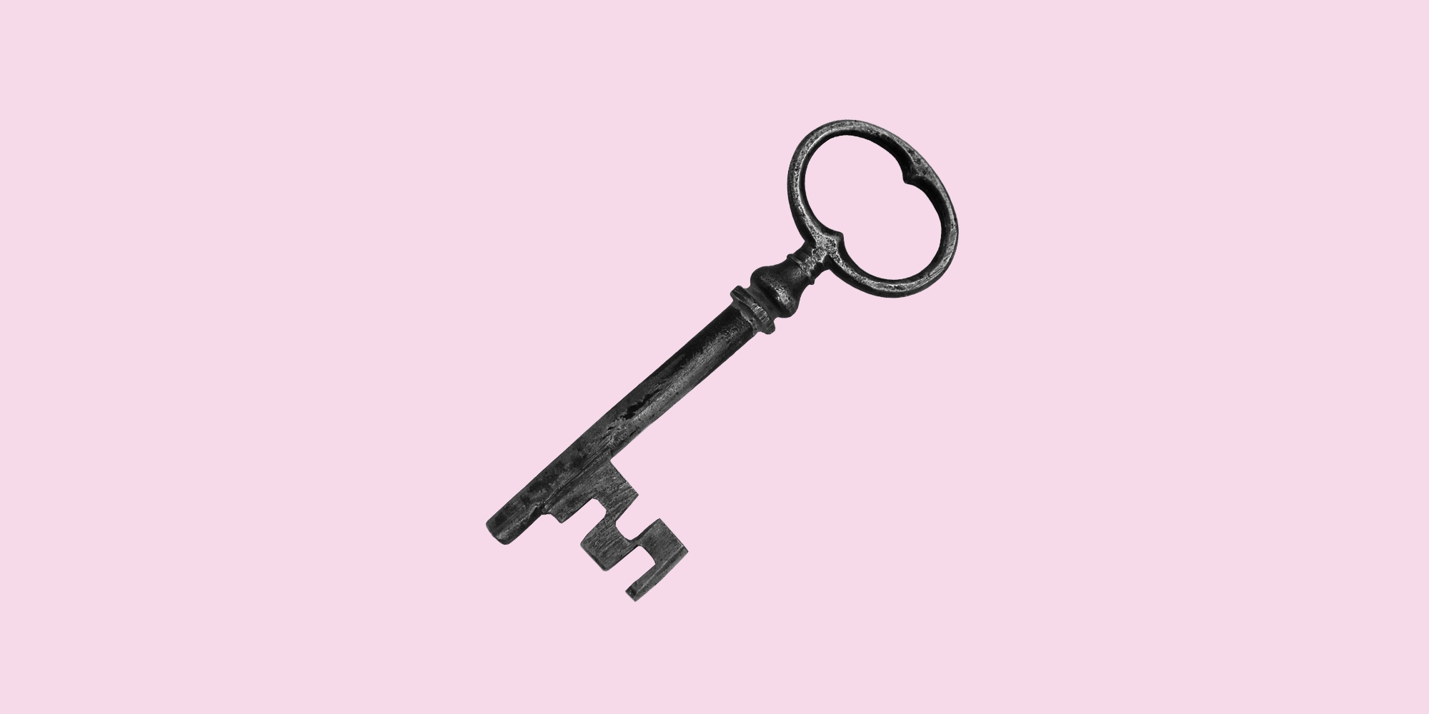 Old fashioned metal key on a lilac background. Tips for handling relapse and getting back into recovery.
