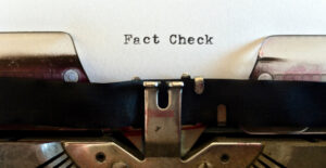 Olf fashioned typewriter with the words "Fact Check" typed on the paper. Debunking Fentanyl Myths