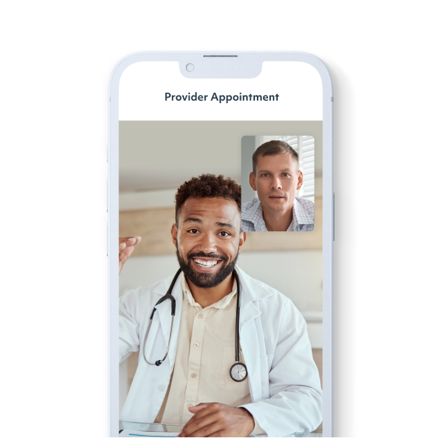 An iPhone displaying a 1:1 provider appointment. A Black male doctor wearing a labcoat and stethoscope is speaking with a White male member via video conferencing.