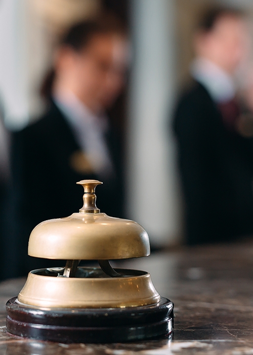 Bell on a hotel front desk