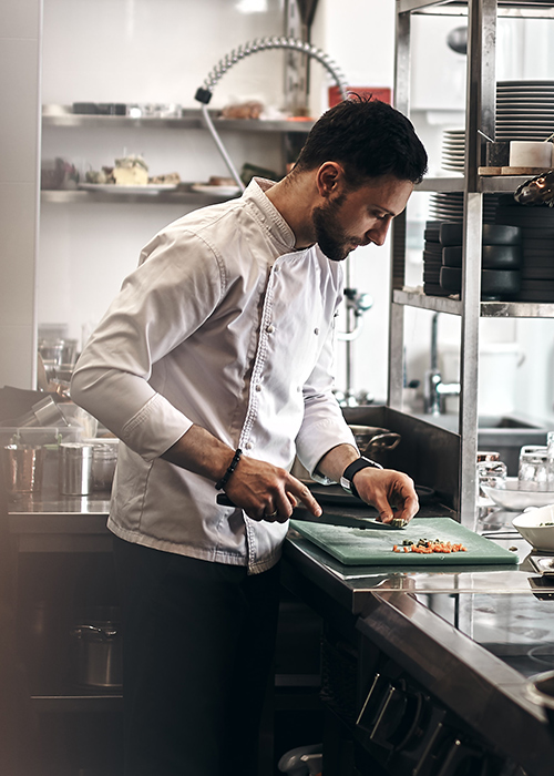 Restaurant chef prepping ingredients