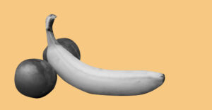 Banana and two plums arranged in a way that looks suggestive of genitals. Safer sex is harm reduction