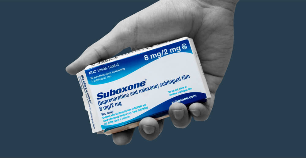 hand holding a Suboxone box. Can you prescribe Suboxone via telemedeicine?