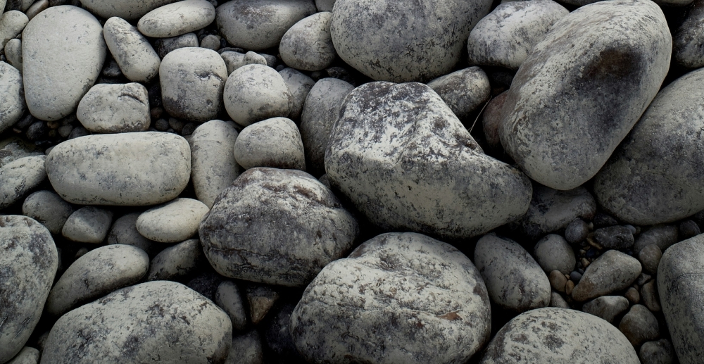 Many rounded gray stones.