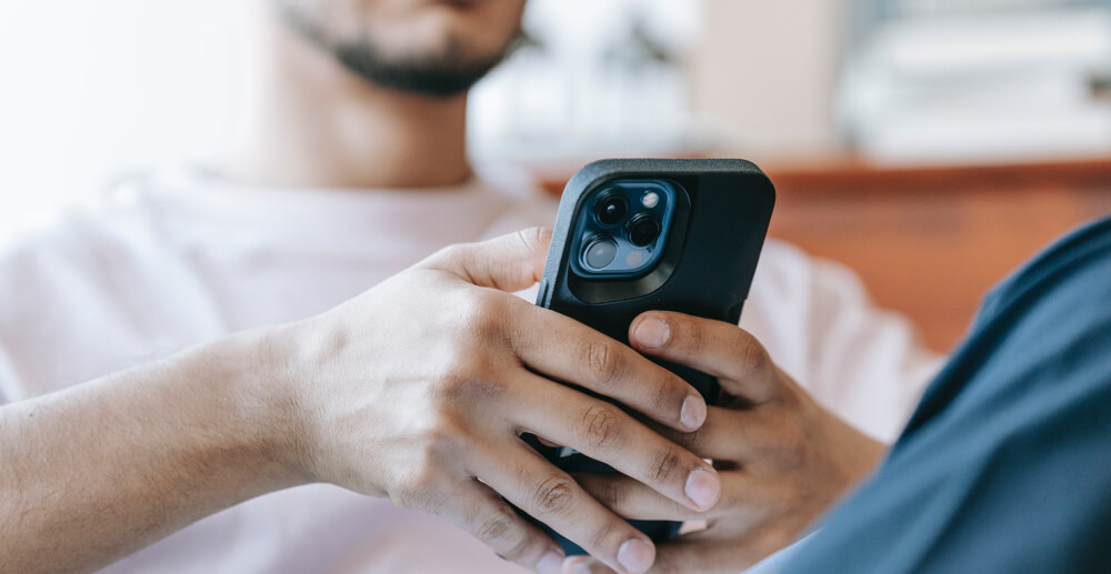 Young man using a smartphone.