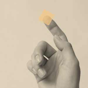 hand with a small, transucent, square film of the medication Belbuca balanced on the tip of the index finger. Is Belbuca the same as Suboxone?