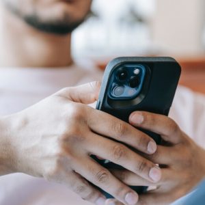 Young man using a smartphone.