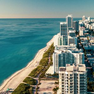 Miami, Florida coastline with tall buildings and sandy beaches