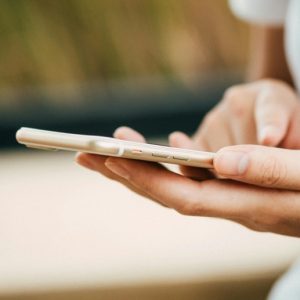 Closeup on hands holding a smartphone