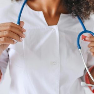 Female doctor with a stethoscope around her neck.