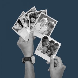 hands holding Polaroid photos of families. Family & recovery: A new beginning