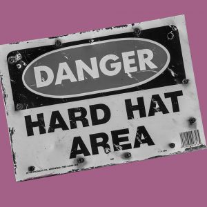 Sign that read, "Danger: Hard Hat Area"