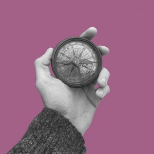 Hand holding a compass. How to know if you should moderate your drinking or quit