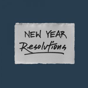 Handwritten note that says "New Year Resolutions". New Year's resolutions fail often.