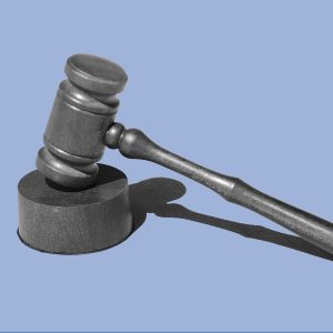 Gavel on a blue background. What's the deal with opiate laws in New Jersey?