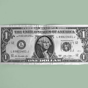 dollar bill on a green background