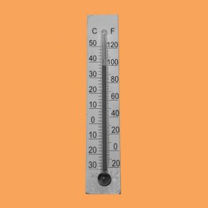 Thermometer on an orange background. Staying sober when the weather is hot