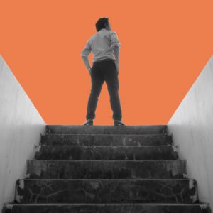 Standing at the top of a staircase, looking out. The Future of Recovery