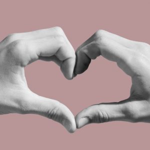 Heart hands. 5 Ways to enjoy Valentine's Day sober and single