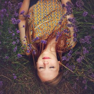 woman-laying-in-flowers