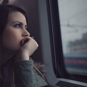 woman-looking-out-window